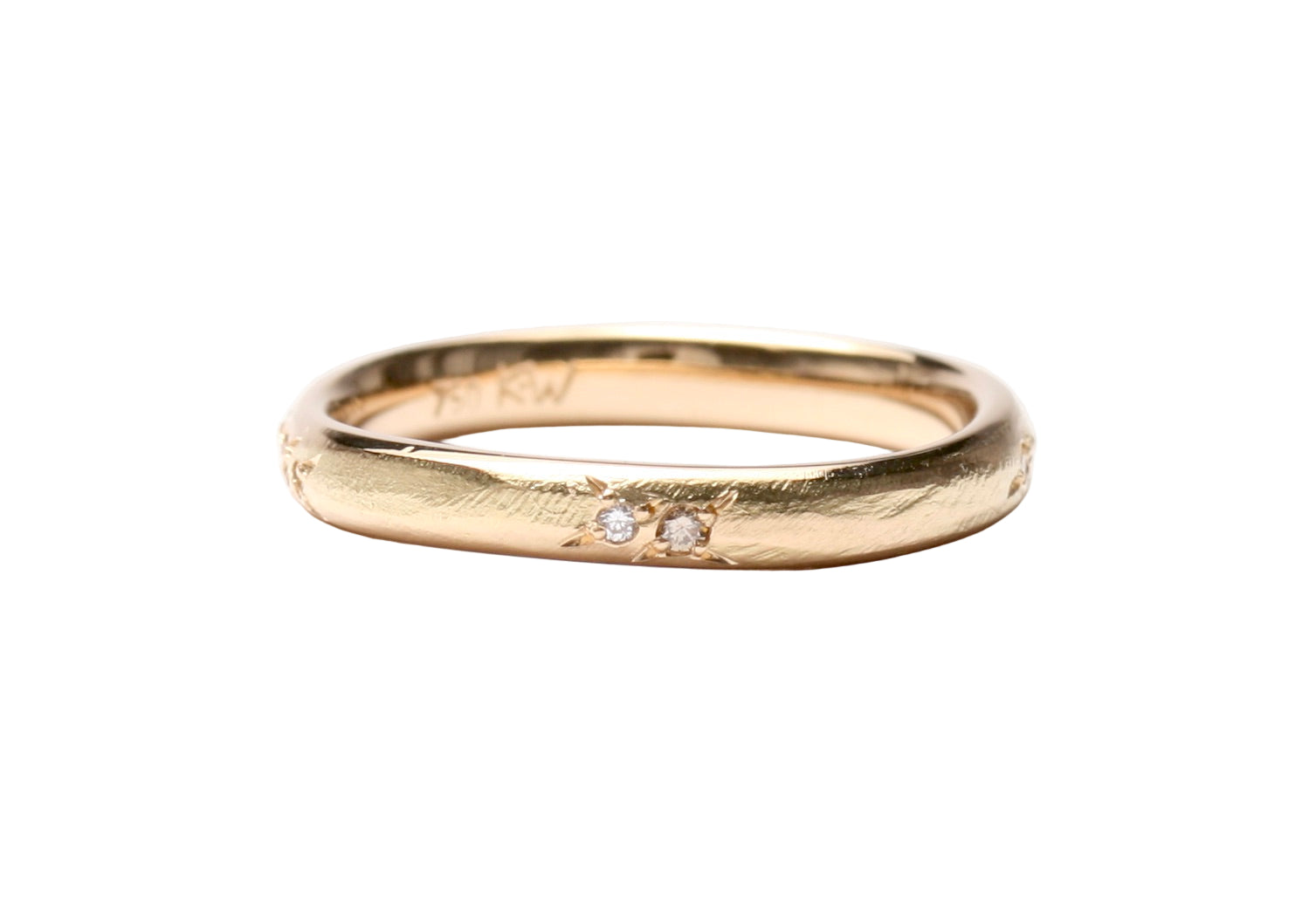 Gold ring with two small diamonds